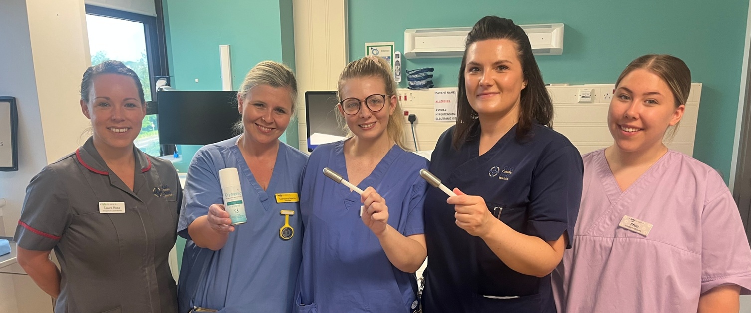 Image shows give women holding medical devices