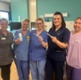 Image shows give women holding medical devices