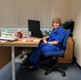 <div><br></div><div><span style="background-color: rgb(255, 255, 255);">Image shows a woman sat at a desk</span><br></div>