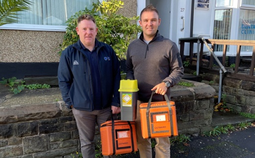 Keith and Rhys stood outside a GP surgery