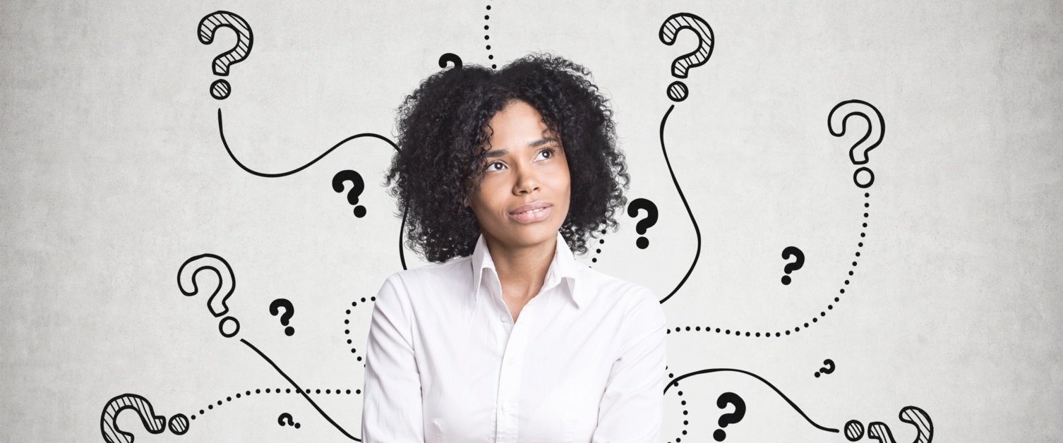 A woman with black afro hair, wearing a white shirt, looks thought. She is surrounded by illustrated question marks.