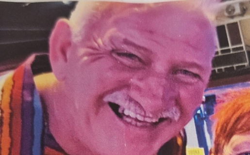 A photo of John with his wife