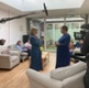 Image shows two women talking while being filmed