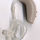 An image of a earmould hearing aid.