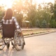 An image of a woman in a wheelchair