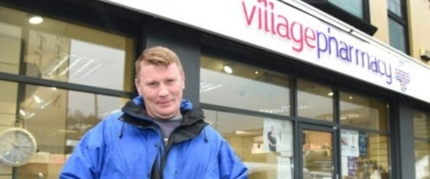 A parent Leigh Matthews standing outside Village Pharmacy