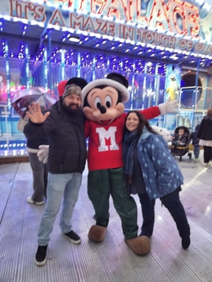 A photo of Louis stood next to his wife