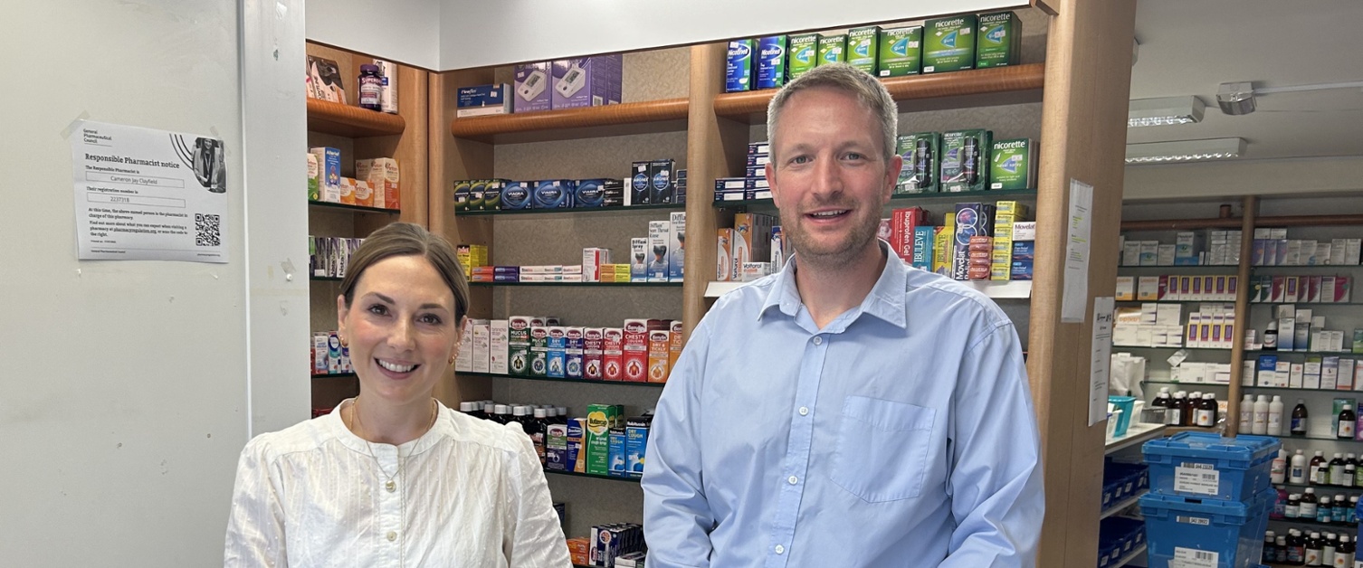 Jonathan and Stacey stood behind the counter