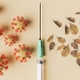 Image shows large viruses divided from autumn leaves by a syringe.