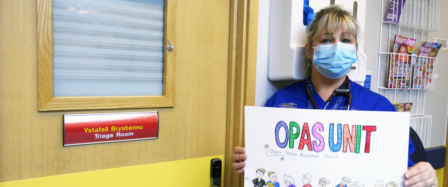 Nurse holding sign