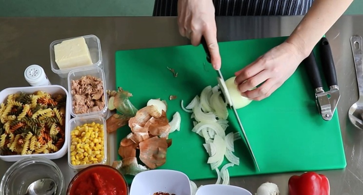 a picture of onions being chopped
