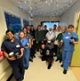 Image shows a group of people standing