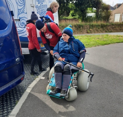 Anita sat in an adaptive wheelchair