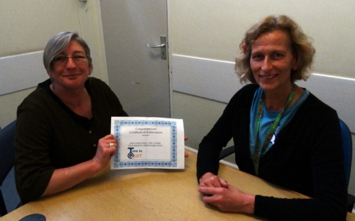 Kelly Wearing receives her certificate of achievement for being 12 weeks smoke free from smoking cessation counsellor Diana Green. 