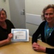 Kelly Wearing receives her certificate of achievement for being 12 weeks smoke free from smoking cessation counsellor Diana Green. 