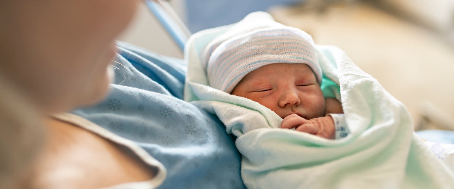 a picture of a newborn baby and mother