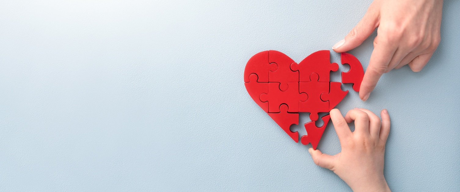 a picture of hands mending a broken heart