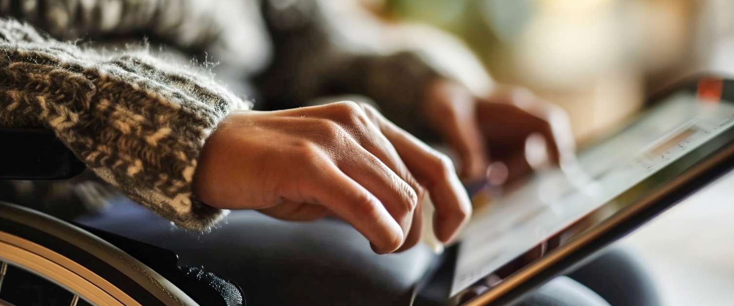 This image shows a wheelchair user adjusting their wheelchair settings.