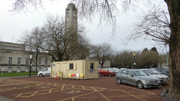 Image shows the Local Vaccination Centre with Guildhall in background.