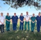 Members of the virtual ward stood in front of a beach