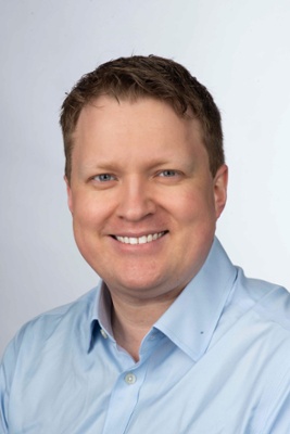 Image shows head and shoulders of Dr Peter Slade.