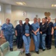 A group of district nurses in uniform.