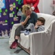 Yanni and mum Pearl speak to Santa using a webcam and television in Ward M