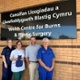 Members of staff from the burns centre holding a hot water bottle