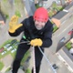 Image shows a man abseiling