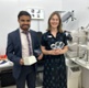 Mohammed and Laura holding visual aids