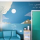 A wall mural featuring images of a tree and the moon