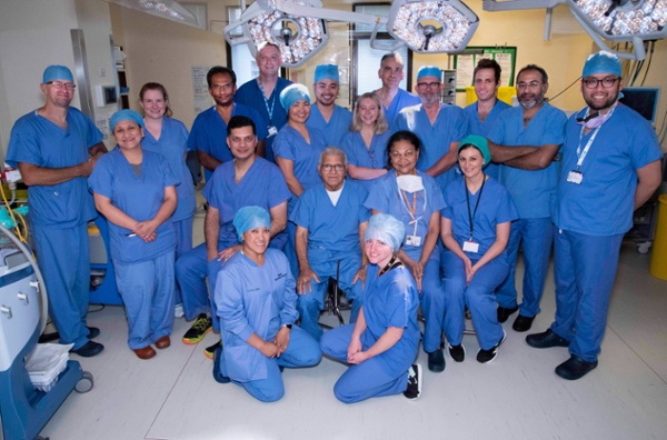 Image of cardiac staff in scrubs inside an operating theatre