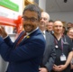 A group of men, including Health Minister Vaughan Gething, smiling at the camera at the opening of the Welsh Centre for Emergency Medical Research at Morriston.