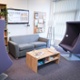 A seating area with sofa and coffee table