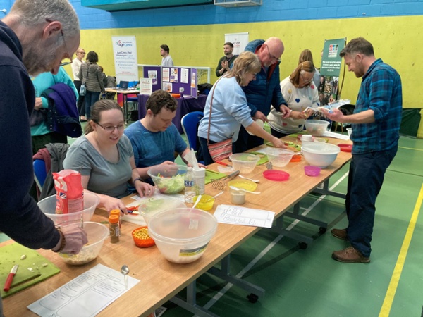 Members of the public during a cookery workshop