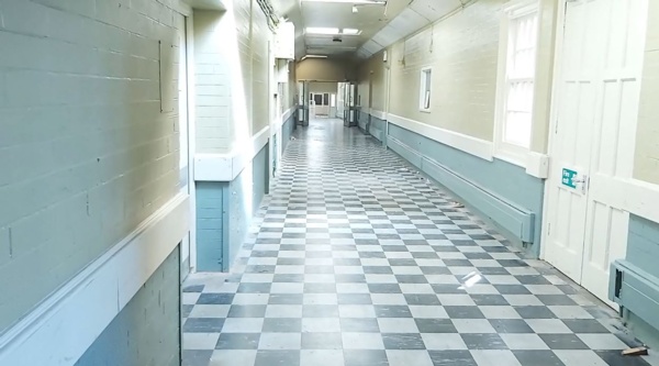 An interior image of the disused section of Cefn Coed Hospital