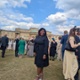 Image shows a woman standing 