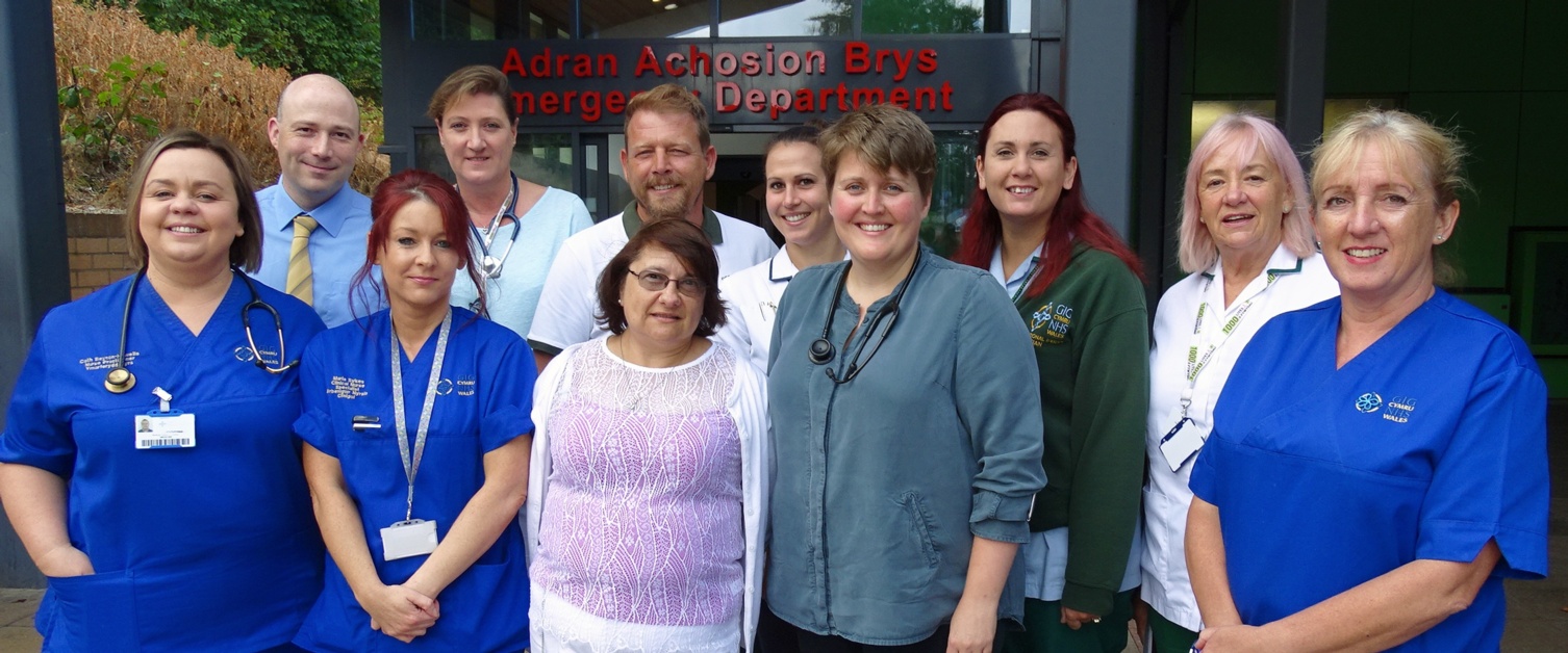 A team photo of smiling staff members