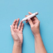 Diabetes finger prick test image.jpeg