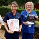 A group holds up the posters advertising testing for syphilis