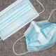 Image shows two surgical masks.