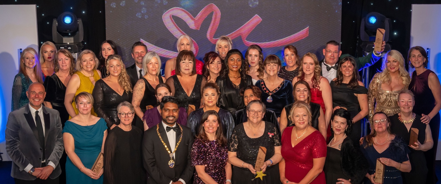 All of the winners stood on the stage