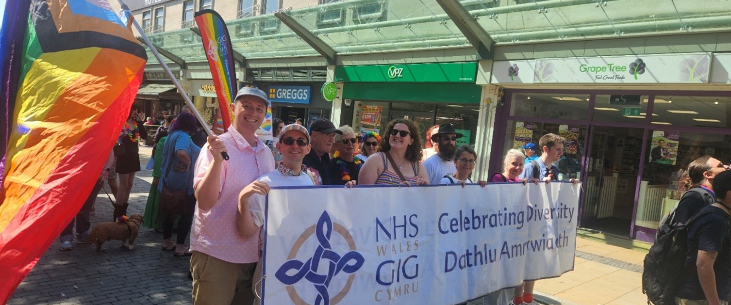 Image shows people during a Pride march