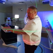 Dr Ryan Davies demonstrates the scanner.JPG