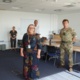Image shows members of Armed Forces Forum standing, socially distanced.