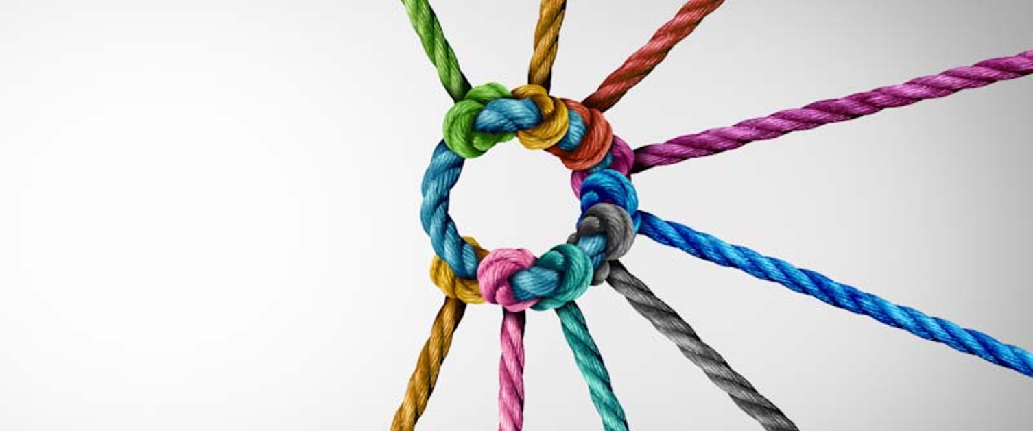 Image shows different colour ropes coming together in a circle.