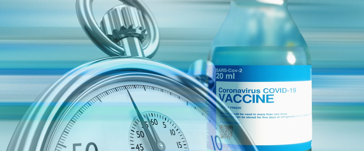 Image shows a stopwatch next to an image of a Covid vaccine vial.