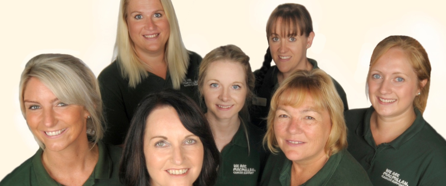 A group of women smiling together - Macmillan Cancer Support Team