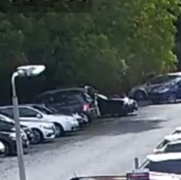 A still from CCTV of a car being stolen from Morriston Hospital