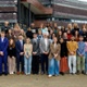 Image shows a group of people standing